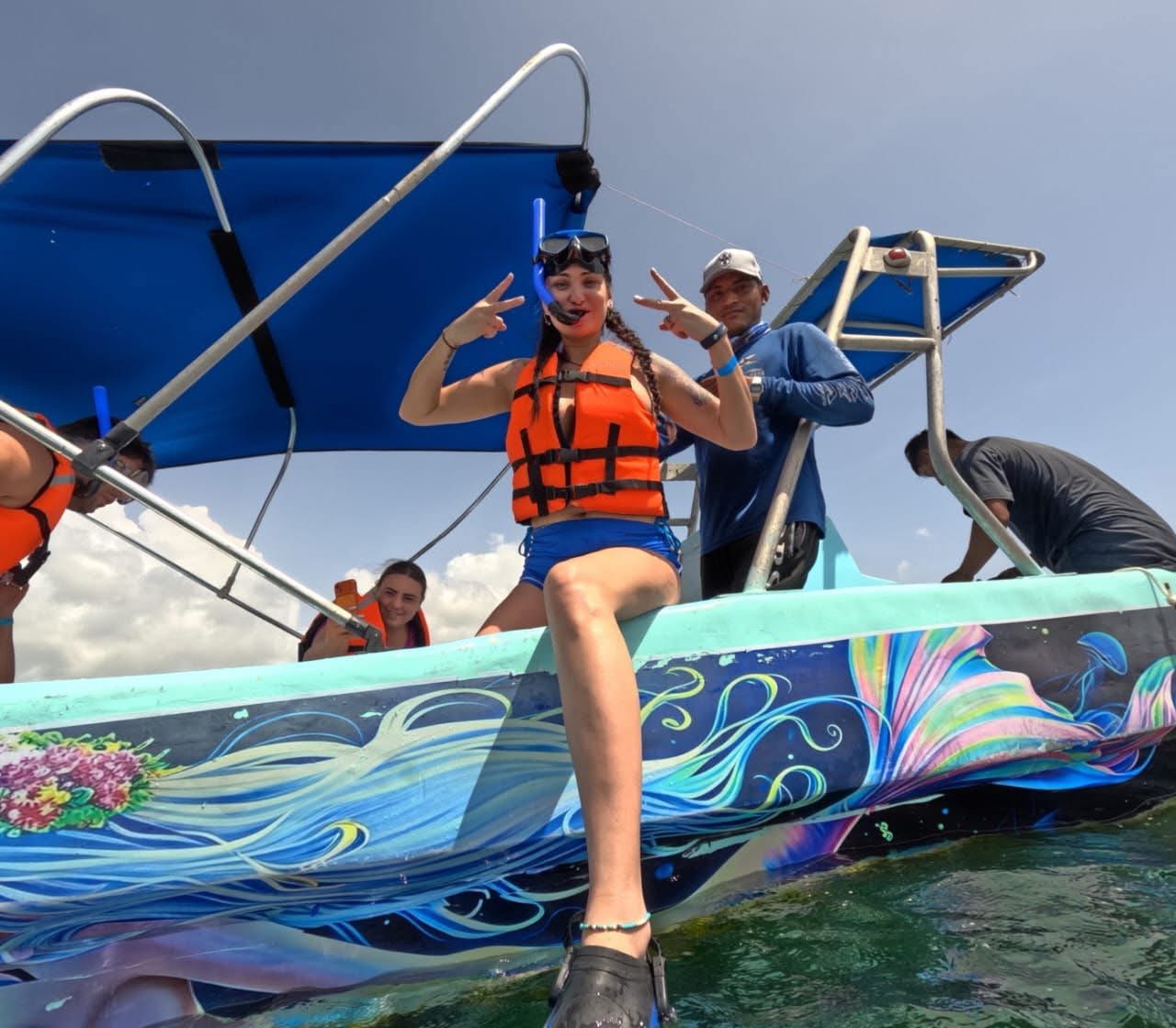 Visitors aboard boat preparing to snorkel